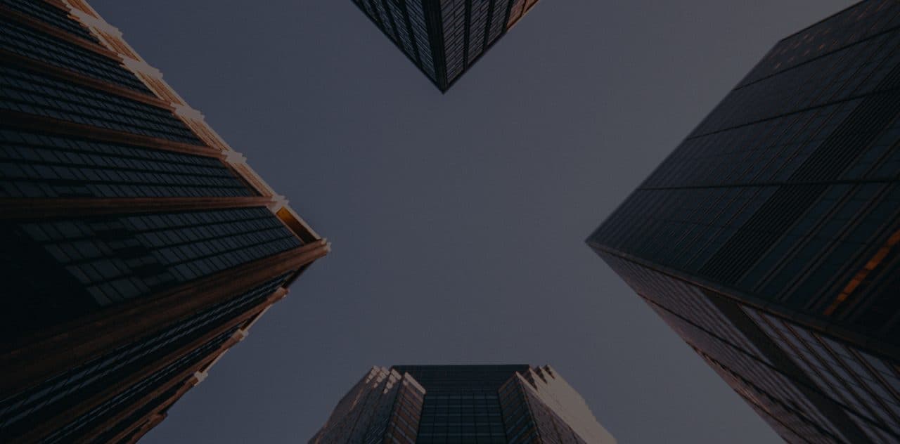 Looking up at modern corporate skyscrapers